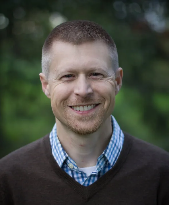 This image has an empty alt attribute; its file name is Josh-Headshot-SM-copy-1.jpg