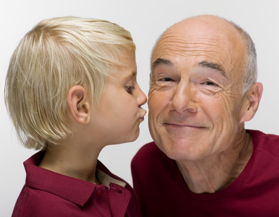 Grandson Kissing Grandfather