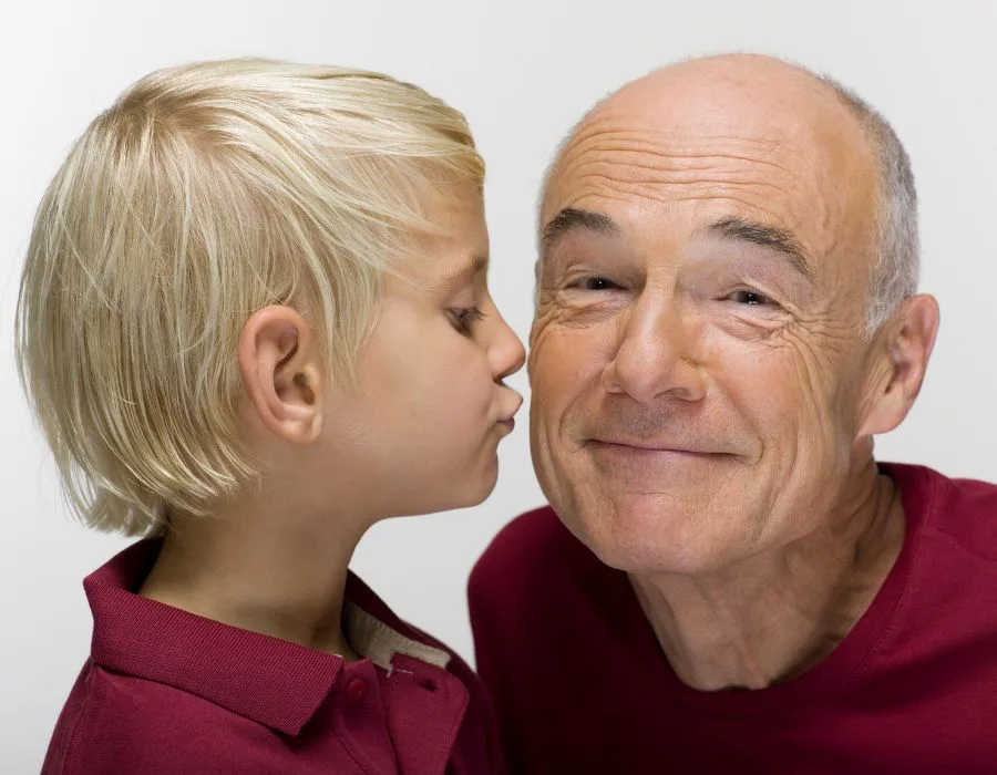 Grandson Kissing Grandfather