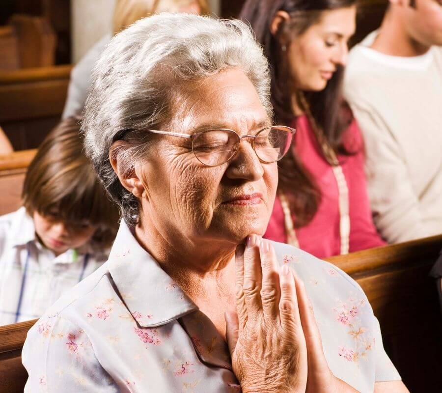 Praying Grandmother in Church reduced